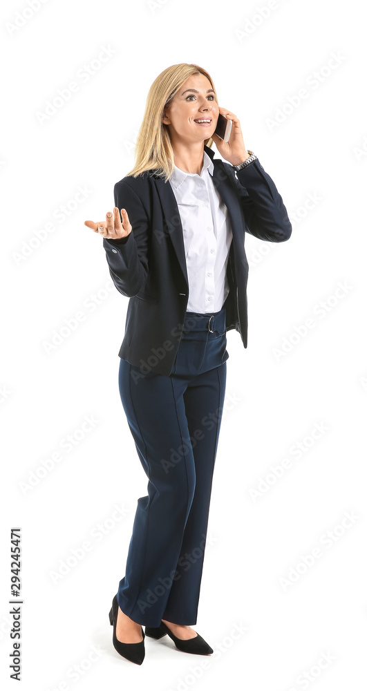 Beautiful stylish businesswoman talking by phone on white background