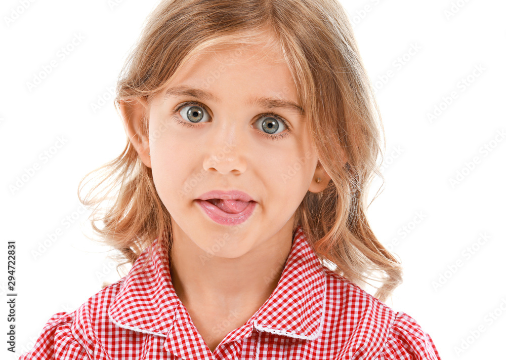 Grimacing little girl on white background