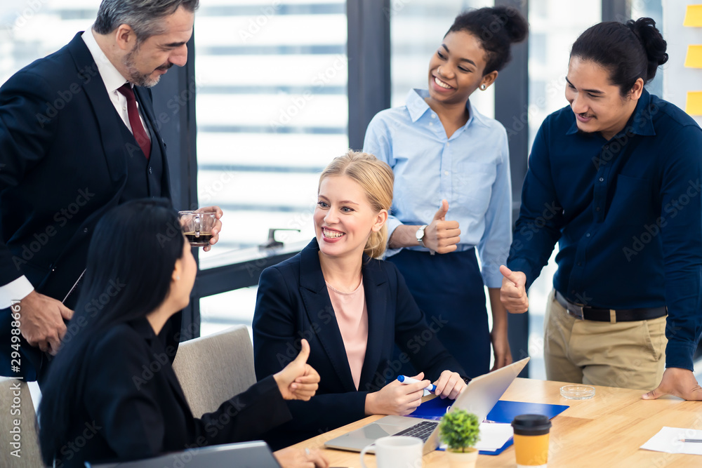 Caucasian business working woman sitting in meeting room receiving complements and congratulations f