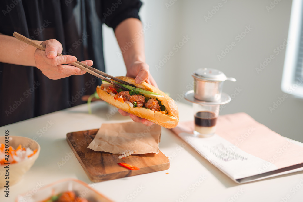 Meatballs served with tomato sauce as sandwich, Vietnamese breakfast