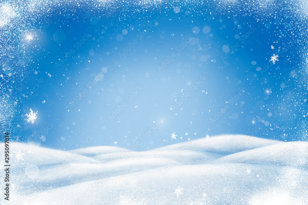 Winter Christmas landscape with snow, snowdrifts and snowfall. Blue background with copy space for y