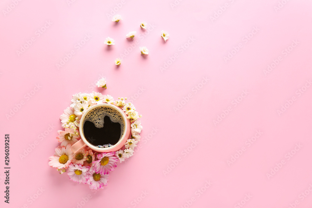 Beautiful flowers with cup of coffee on color background