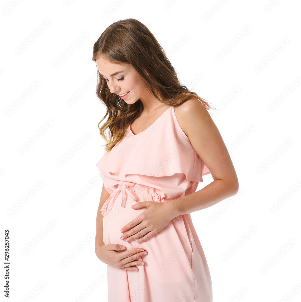 Young pregnant woman on white background