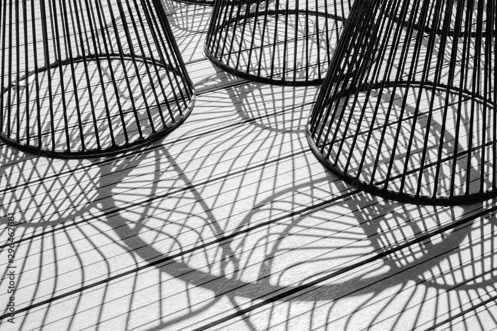 abstract backgrounds shadow of steel rod outdoor-chairs lay beautifully & looks dimension over light