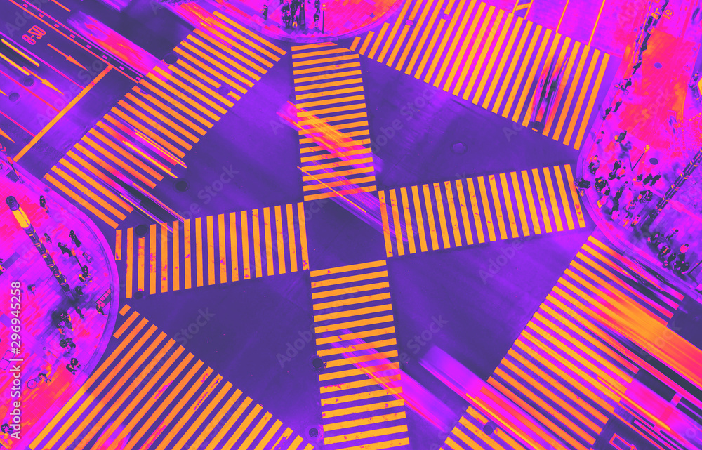 Aerial view of traffic crossing a big intersection in Ginza, Tokyo, Japan at night synth wave style