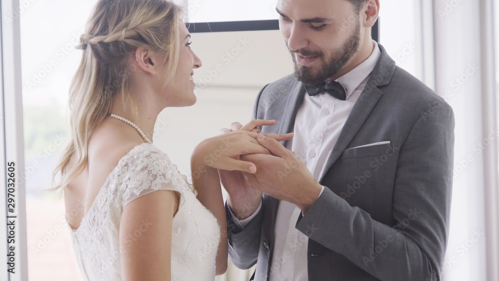 Happy bride and groom in wedding dress prepare for married in wedding ceremony. Romantic love of man