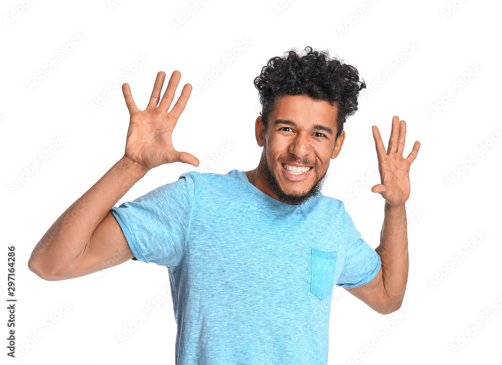 Portrait of happy African-American man on white background