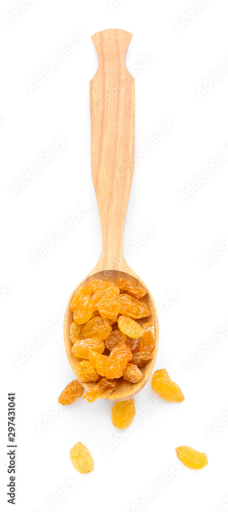 Spoon with raisins on white background