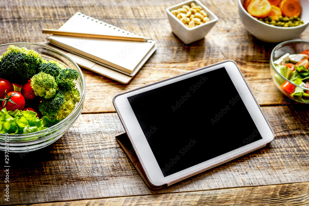 concept diet and tablet with vegetables mock up