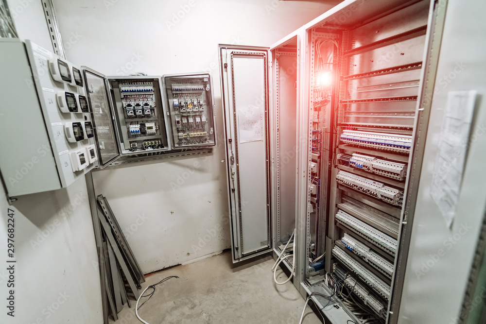 Electrical panel at a assembly line factory. Controls and switches.