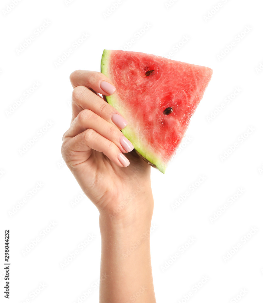 Female hand with piece of juicy watermelon on white background