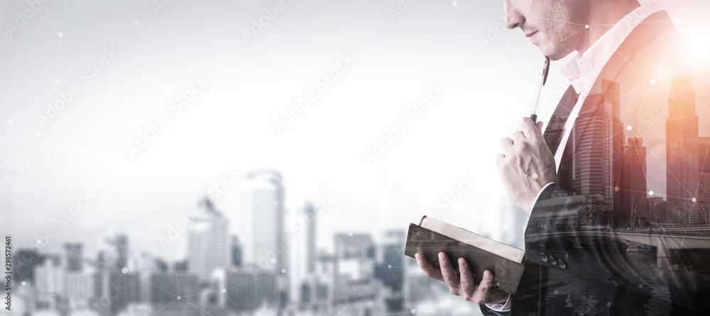 Double Exposure Image of Business Person on modern city background. Future business and communicatio