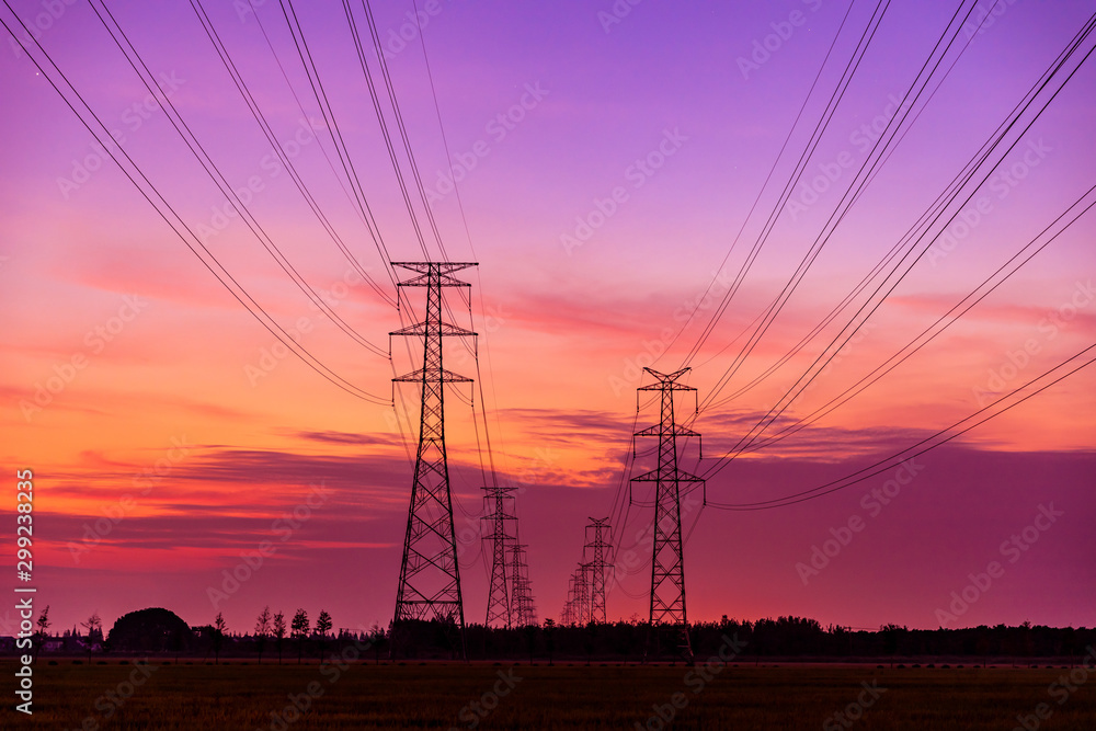 High voltage electricity tower sky sunset landscape,industrial background.