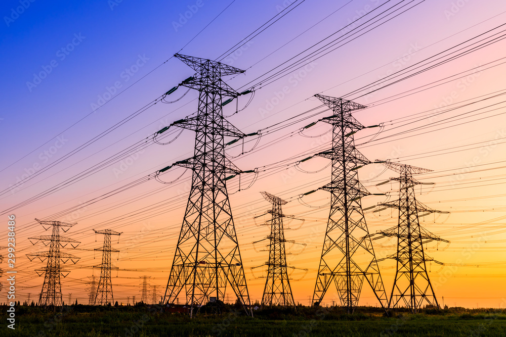 High voltage electricity tower sky sunset landscape,industrial background.