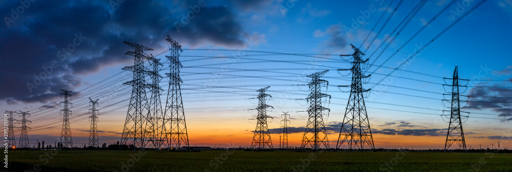 High voltage electricity tower sky sunset landscape,industrial background.