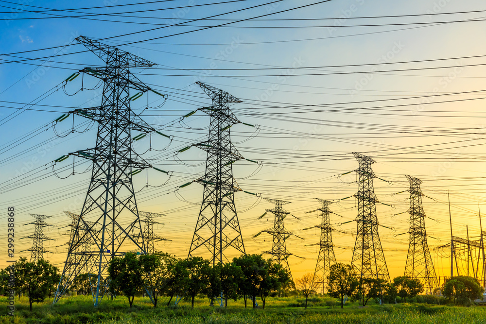 High voltage electricity tower sky sunset landscape,industrial background.