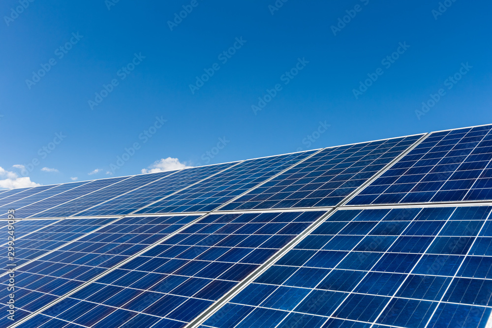 solar panels against a blue sky