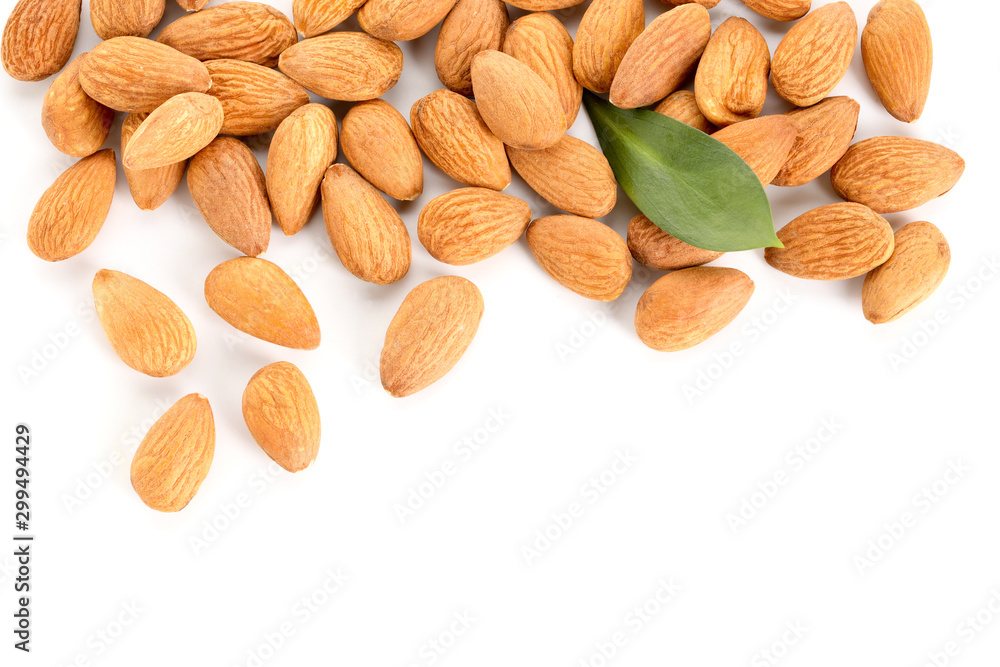 Tasty almonds on white background