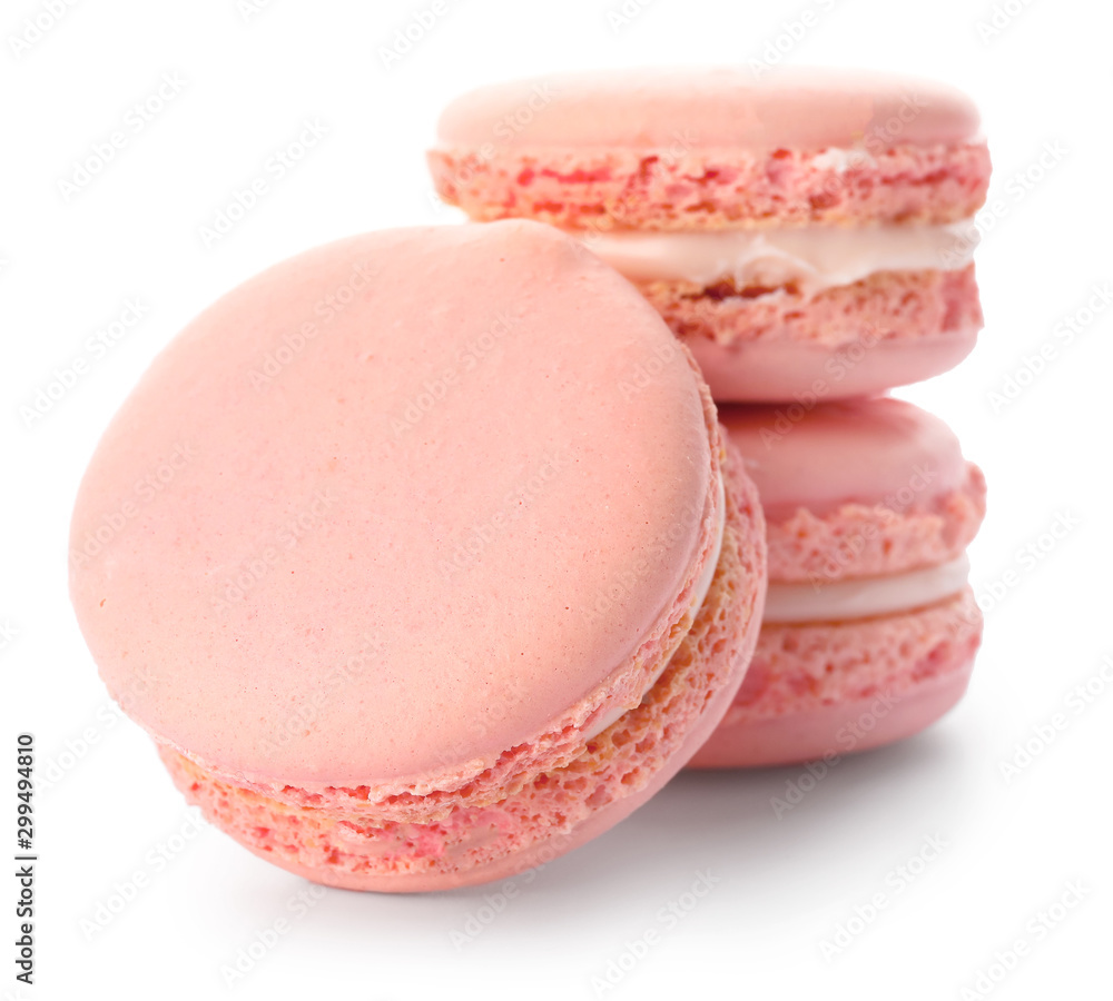 Tasty macarons on white background