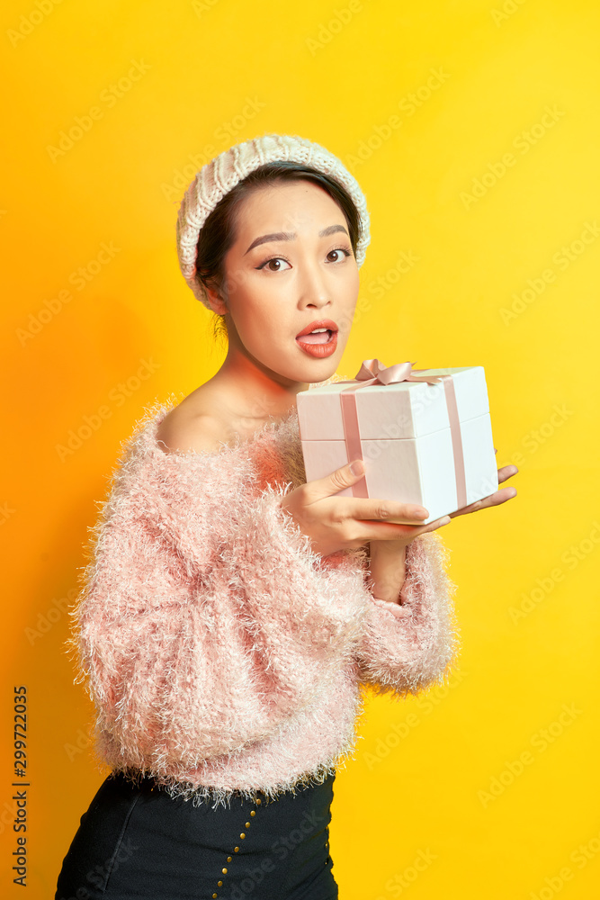 Cheerful women with a present