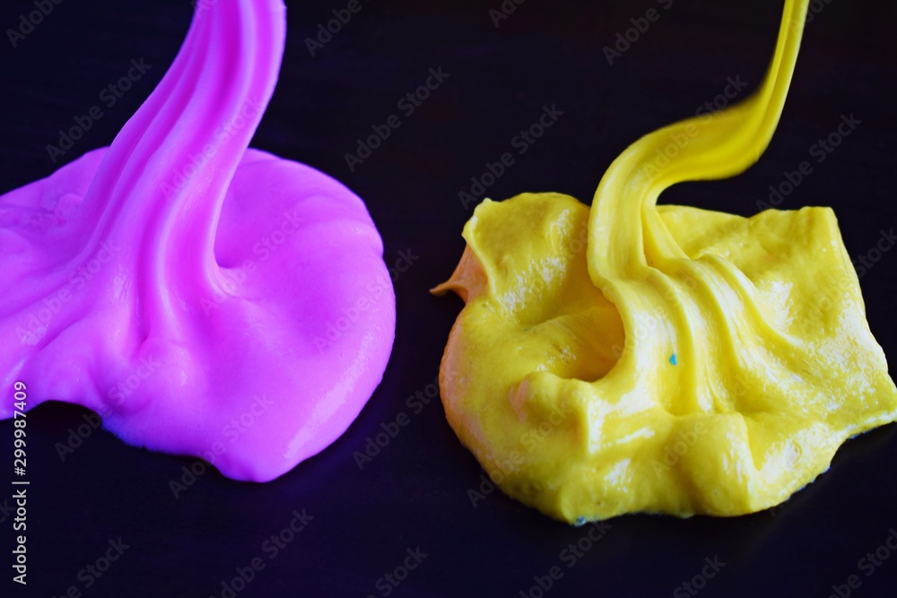 Beautiful slime on black background.Funny childrens toy.