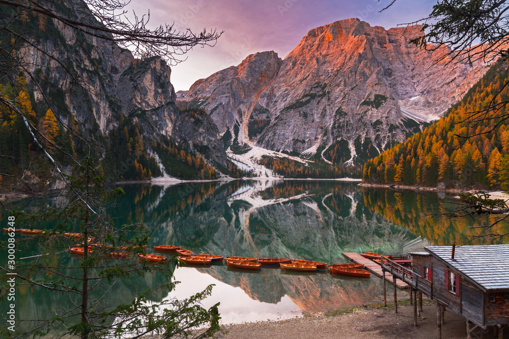 Lago di Braies lake and Seekofel peak at sunrise, Dolomites. Italy