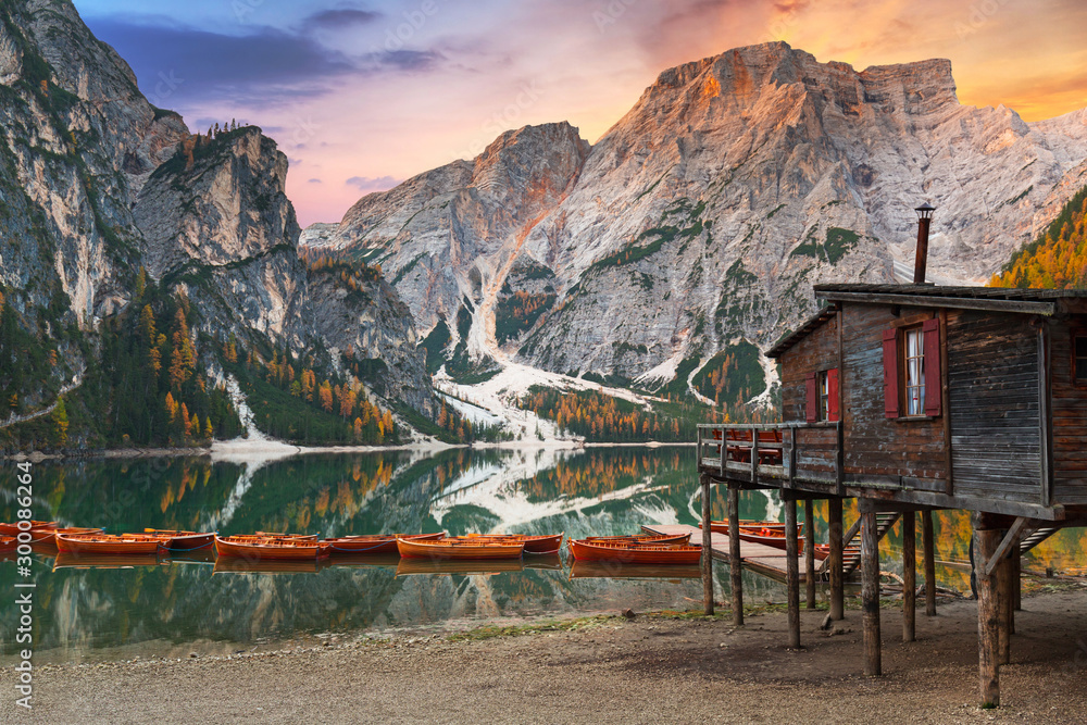 Lago di Braies lake and Seekofel peak at sunrise, Dolomites. Italy