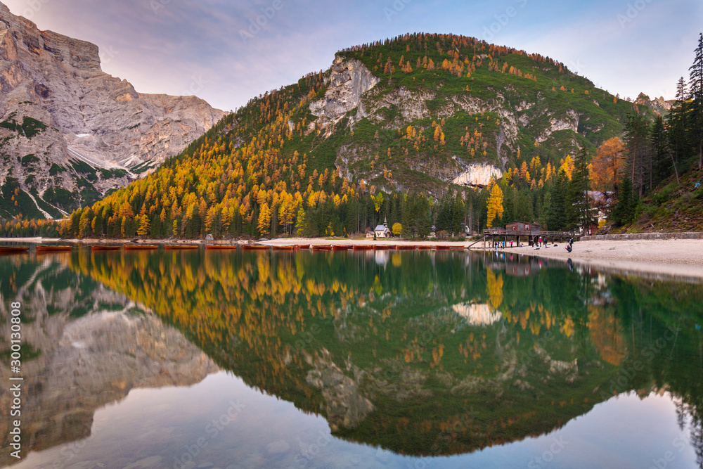 Lago di Braies lake and Seekofel peak at sunrise, Dolomites. Italy