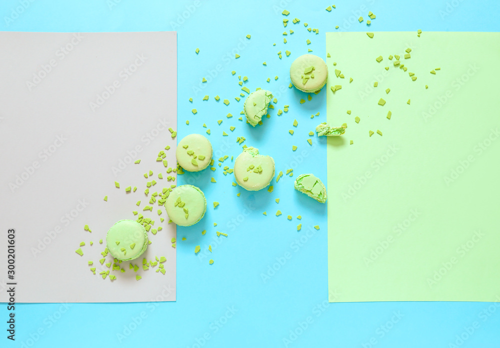 Tasty macarons on color background