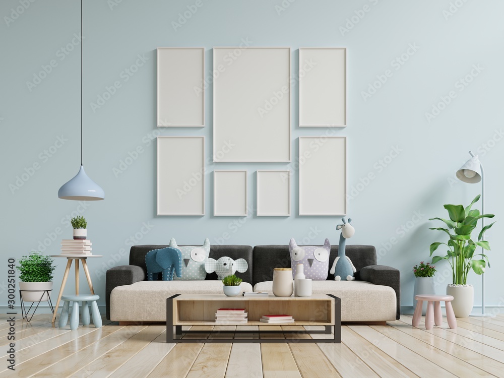 Modern living room interior with sofa and green plants,lamp,table on blue wall background.