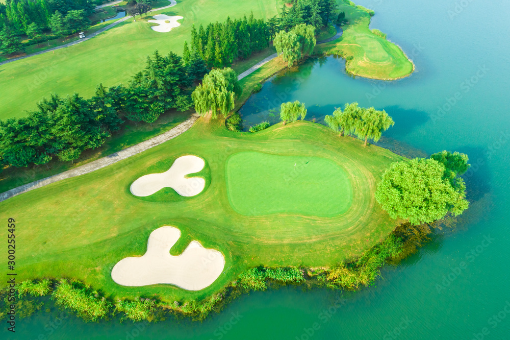 Aerial view of golf course and water