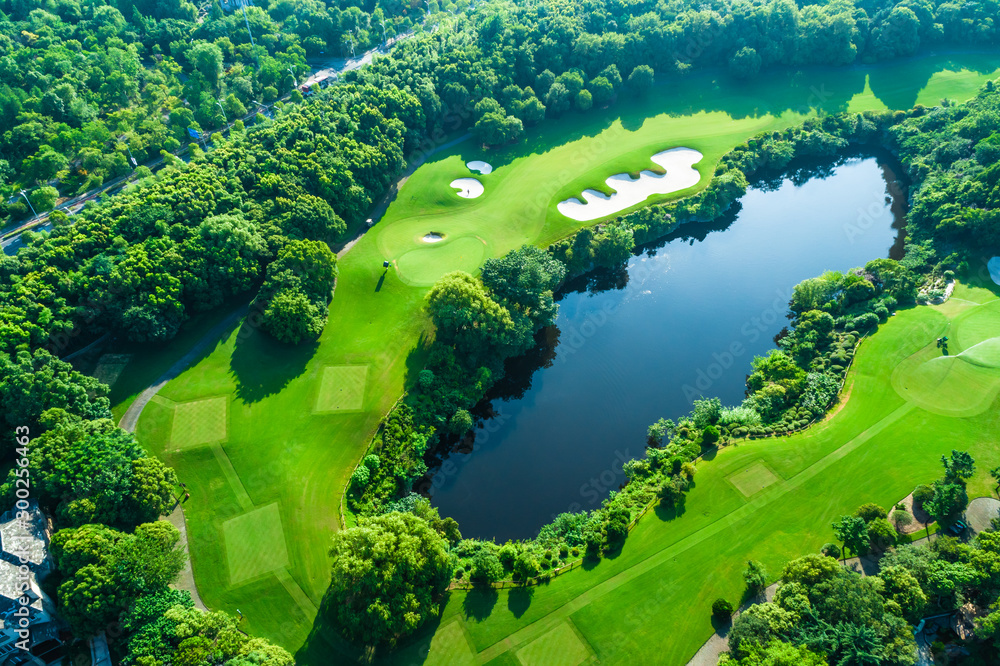 Aerial view of golf course and water