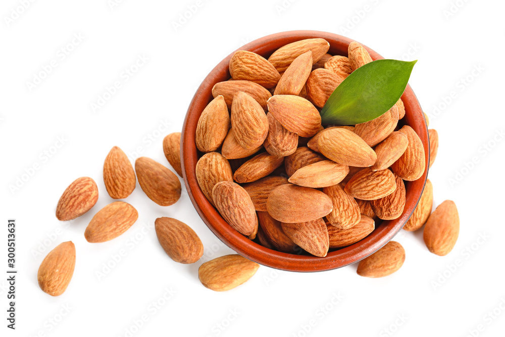 Bowl with tasty almonds on white background