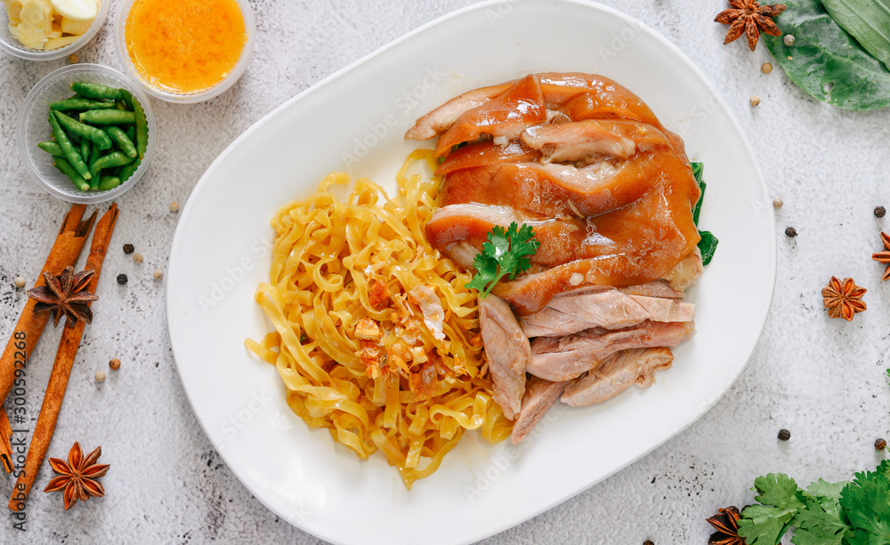 Stewed pork leg on noodle , Famous Thai food.