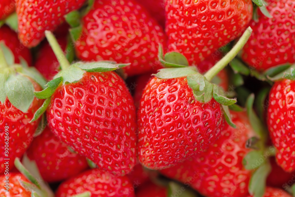 Beautiful and delicious strawberries in a wooden box basket, concept of organic farming, fresh direc