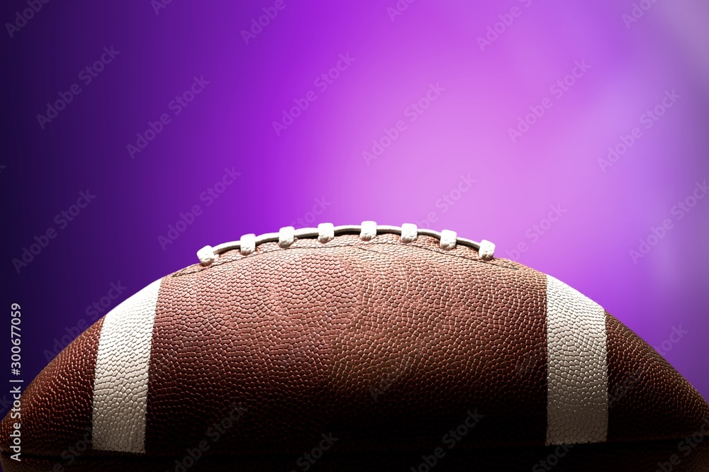 American football ball on background