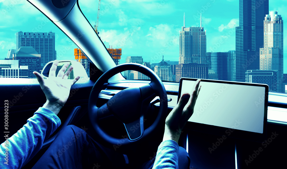 Person using a car in autopilot mode hands free