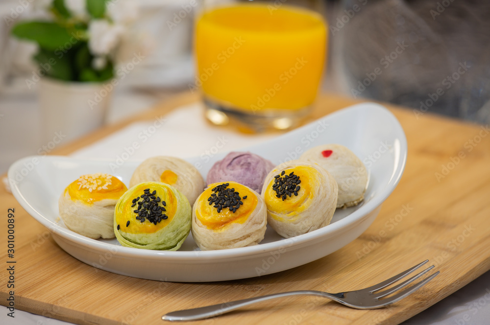 Dessert Mochi or Chinese pastry-bean cake with egg yolk.