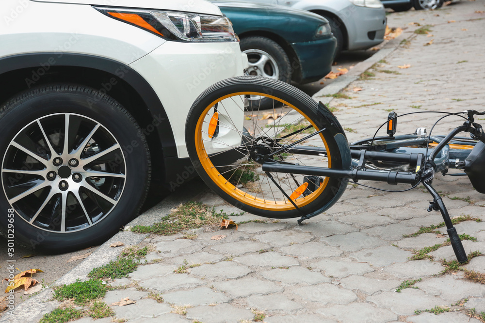 Accident between car and bicycle on city street