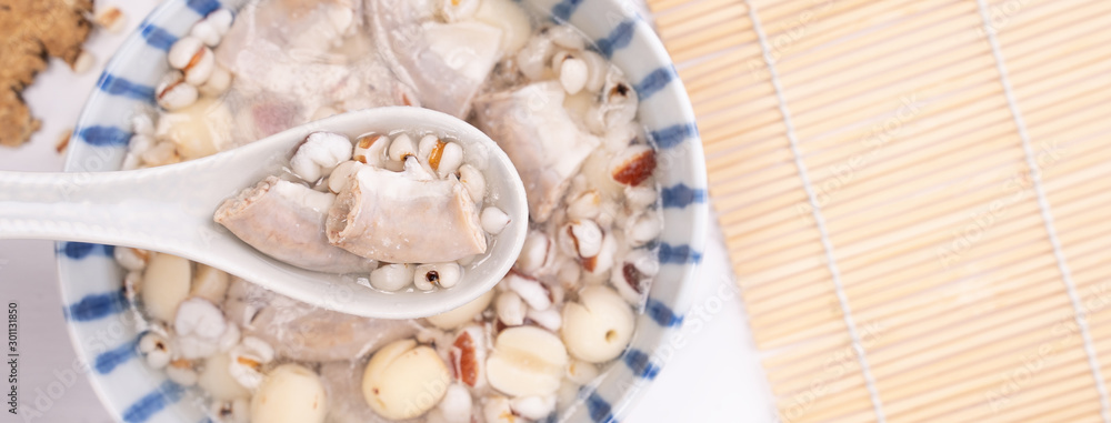 Tasty Four Tonics Herb Flavor Soup,Taiwanese traditional food with herbs,pork intestines on white wo