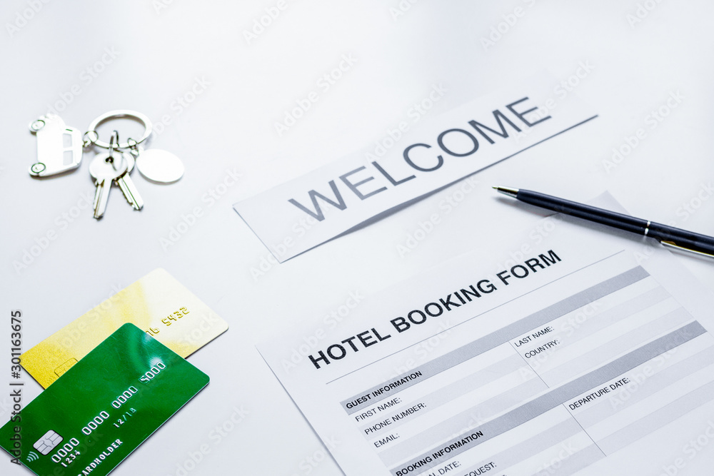 reservation form on hotel reception desk background