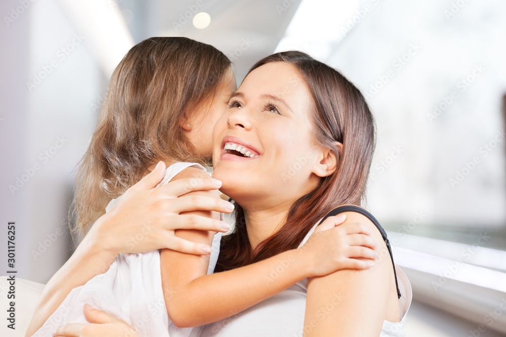 Happy Mother and daughter hugging