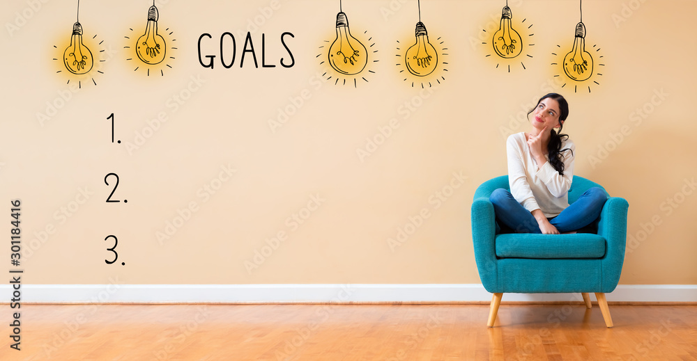 Goal list with woman in a thoughtful pose in a chair