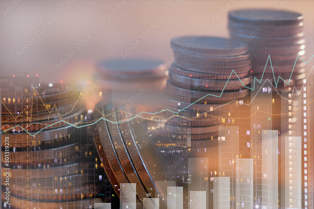 Financial investment concept, Double exposure of city night and stack of coins for finance investor,