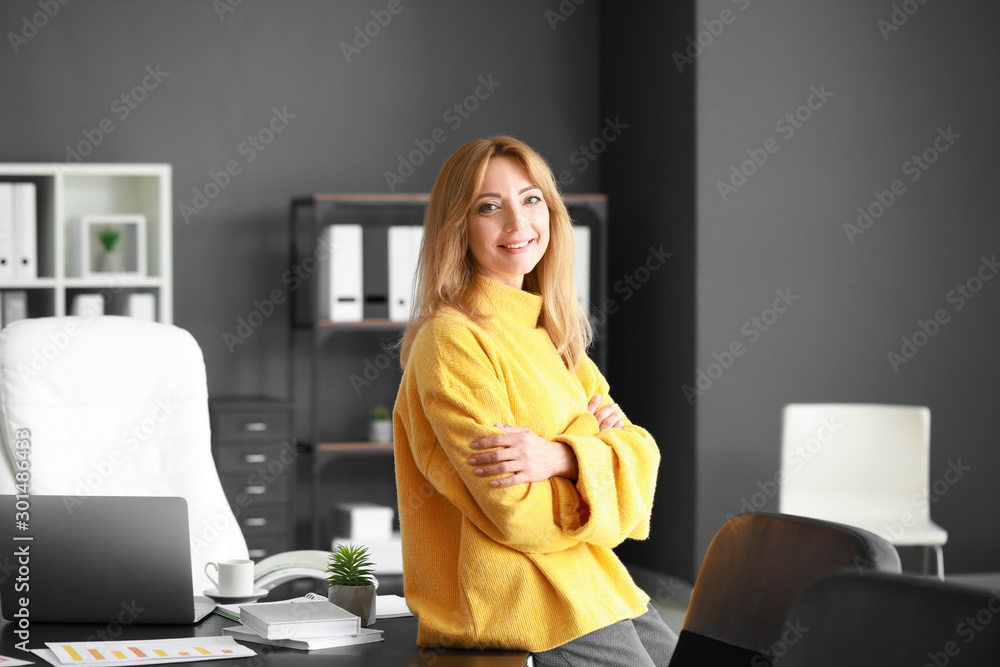 Portrait of mature businesswoman in office