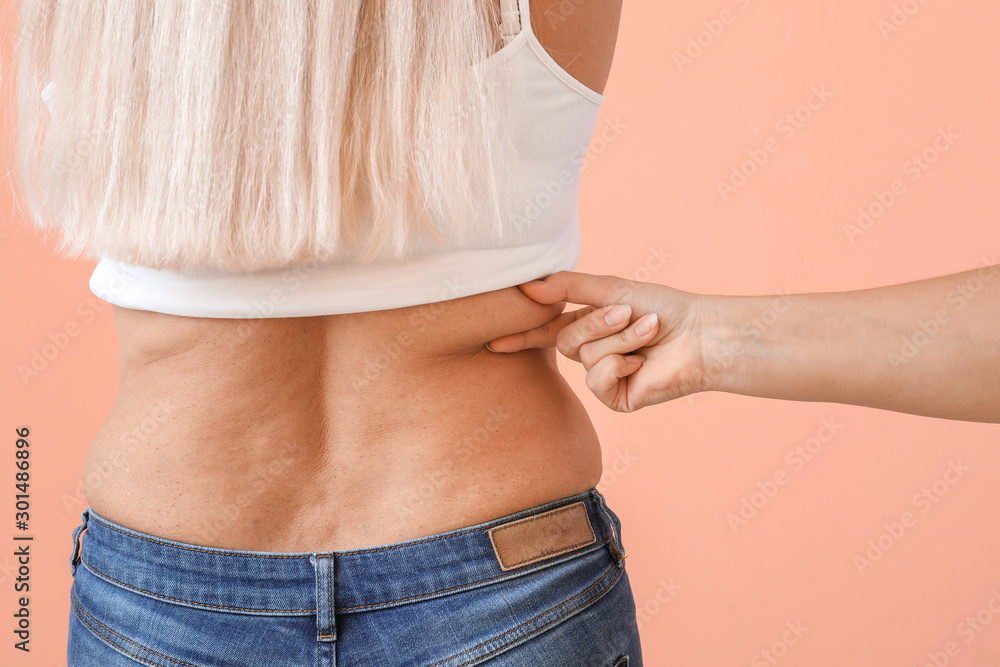 Body positive woman on color background, closeup