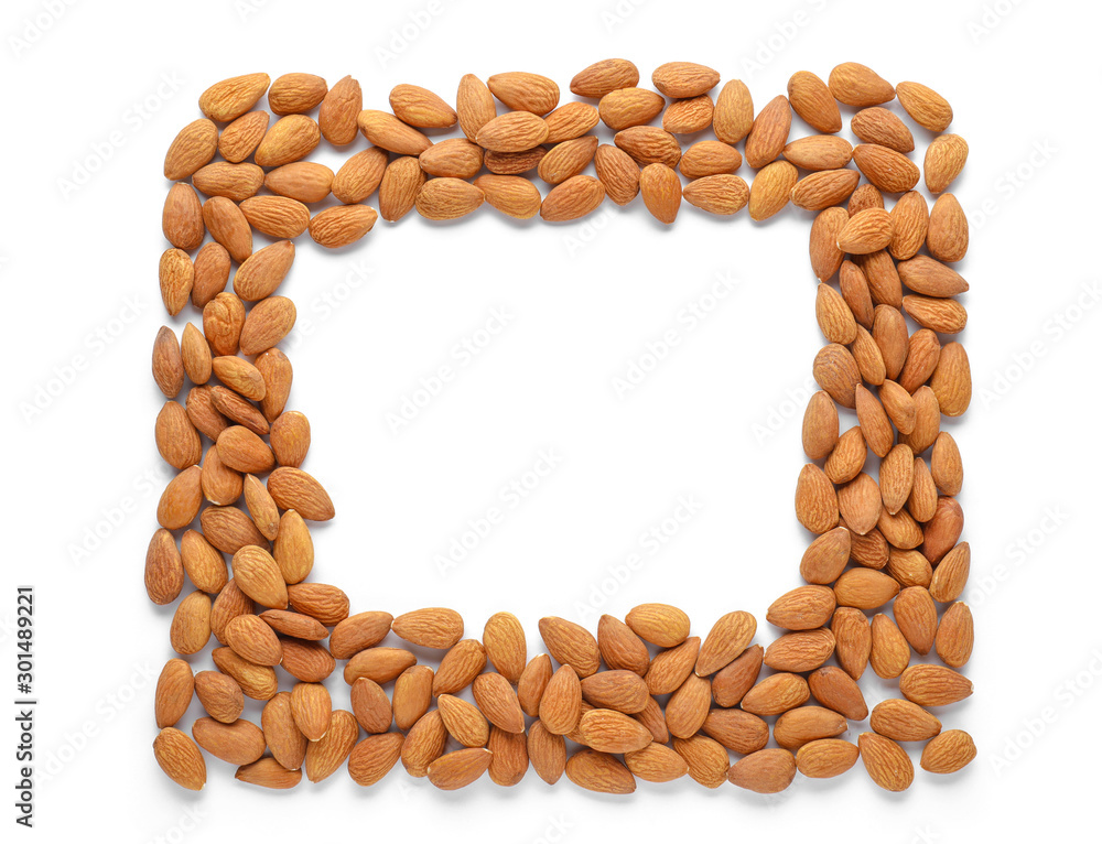 Frame made of almonds on white background