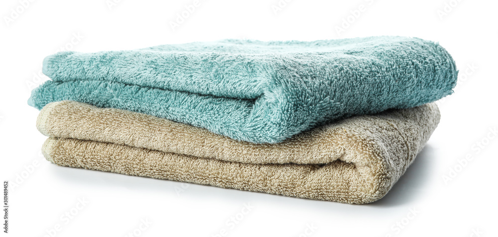 Soft clean towels on white background