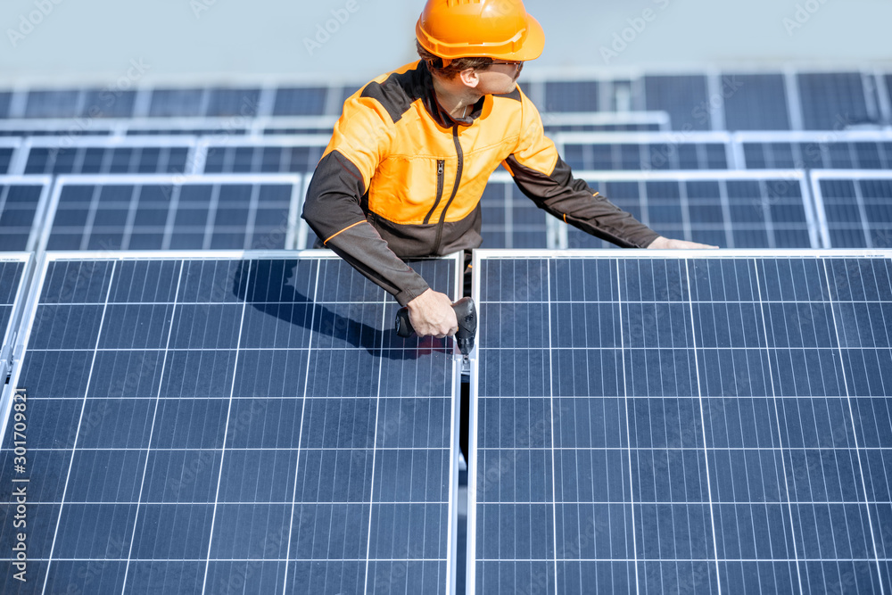 Workman on the solar station