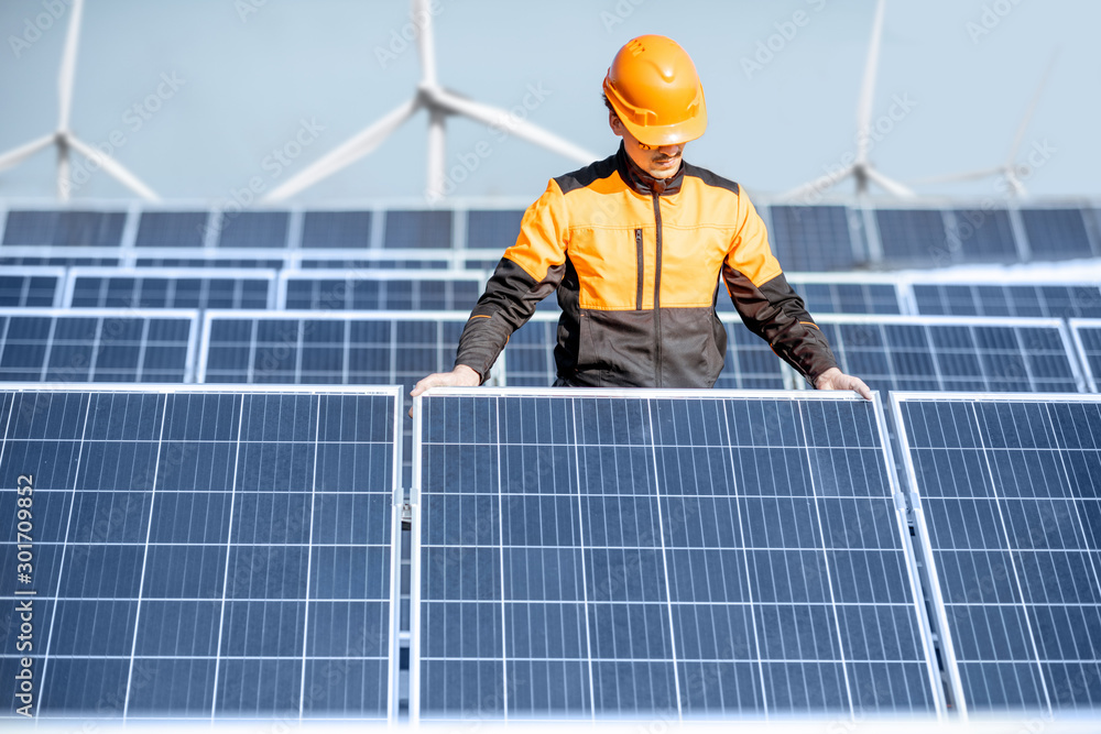 Workman on the solar station